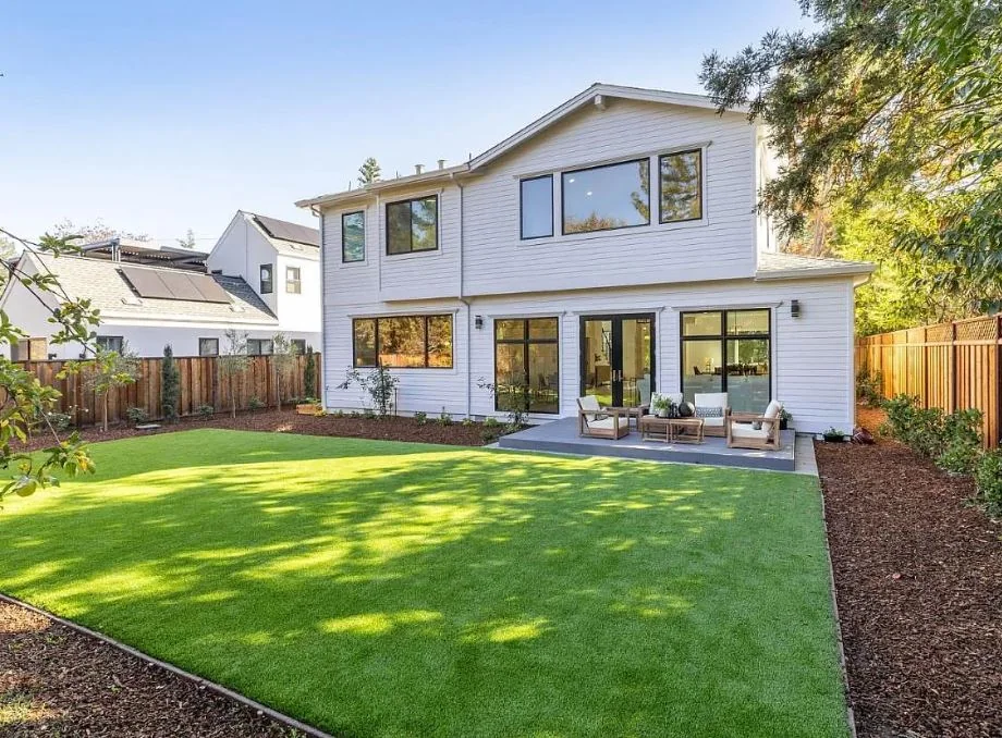 Sky & Song's Belmont family retreat opening onto a landscaped garden